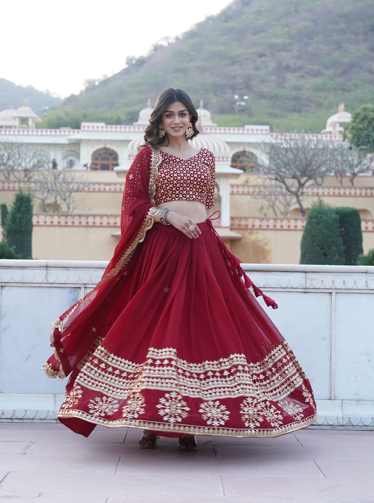 Maroon Faux Georgette Sequins Embroidered Lehenga Choli