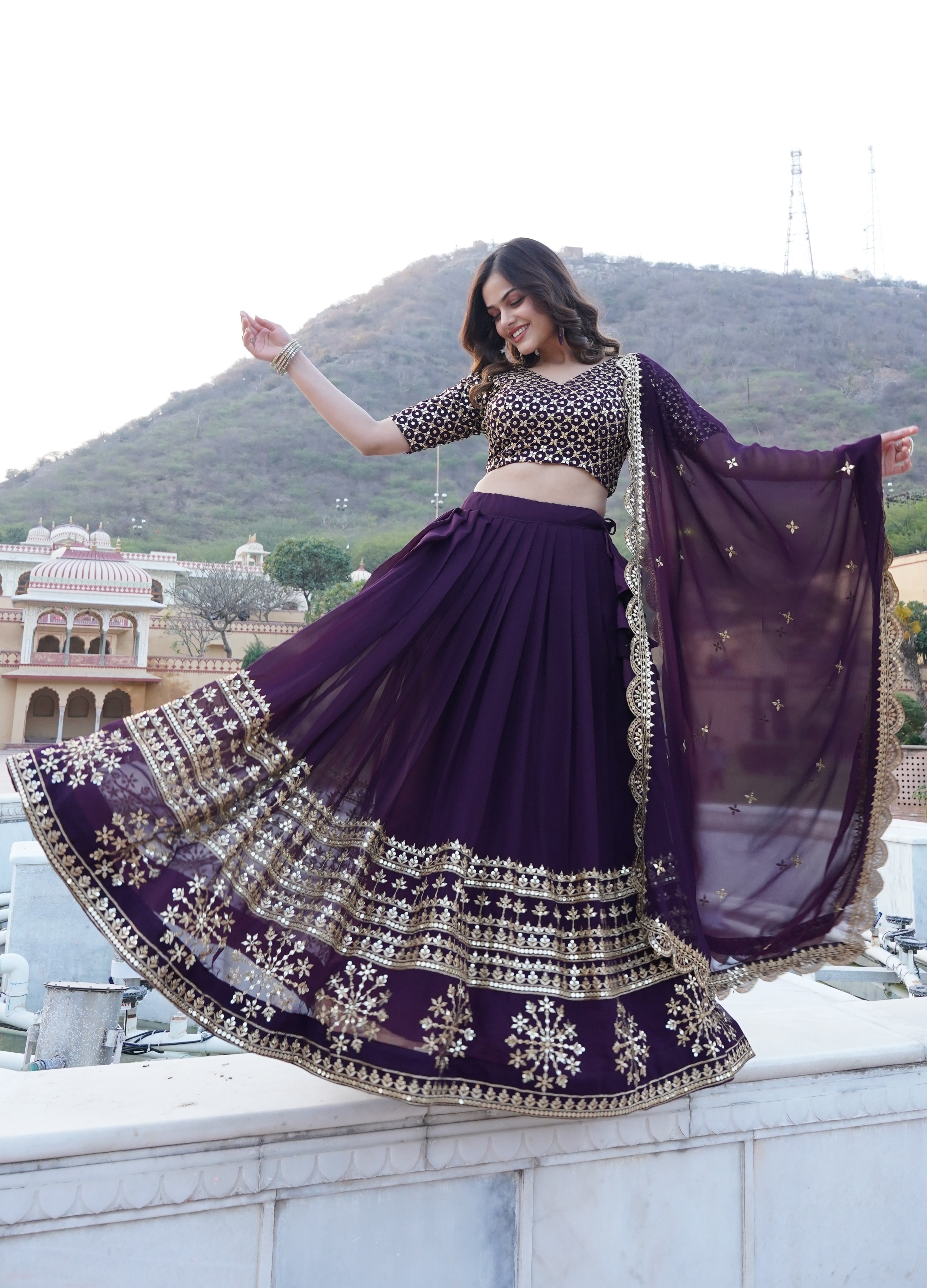 Wine Faux Georgette Sequins Embroidered Lehenga Choli