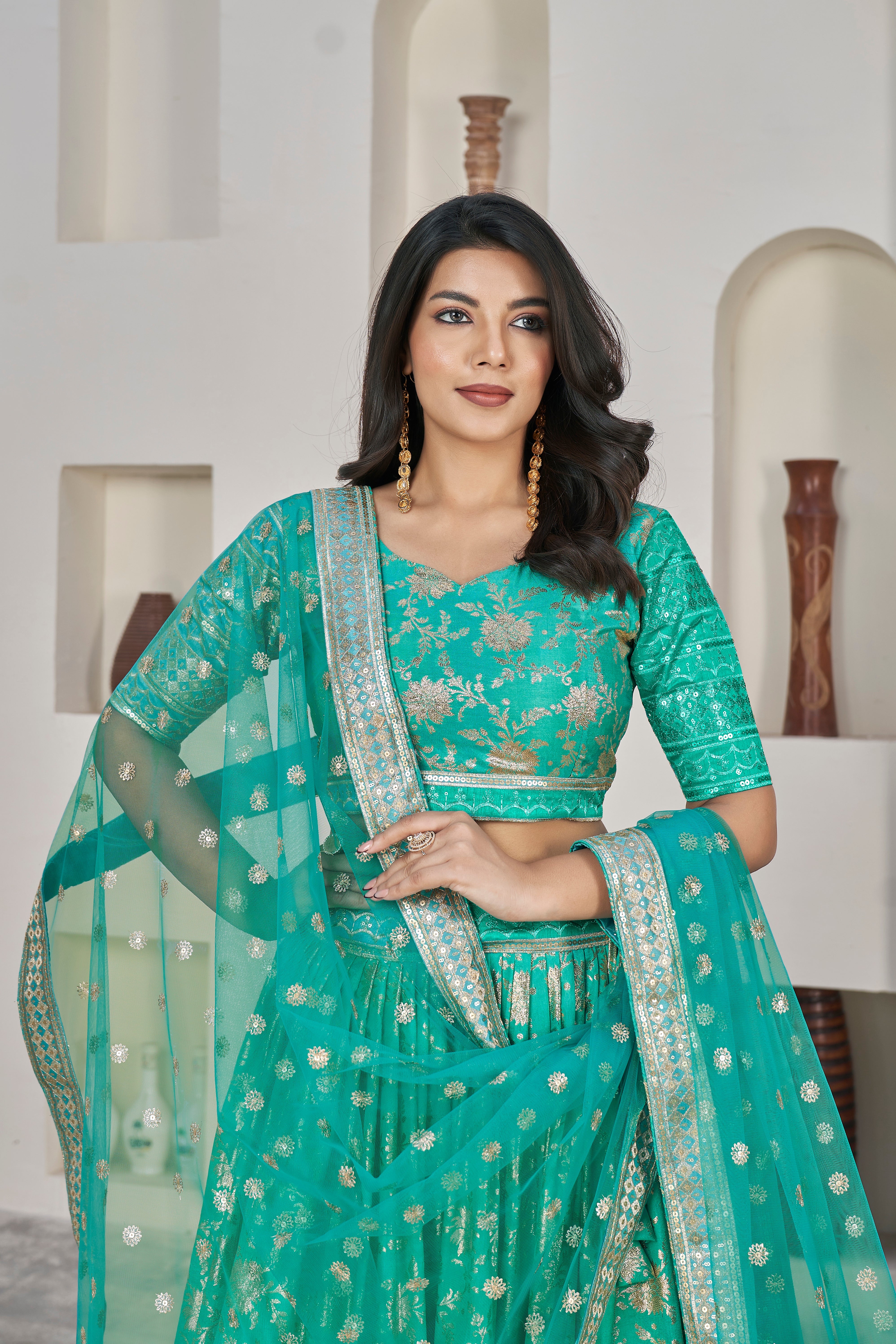 Sea Green Dolla Silk Woven Zari Embroidered Lehenga Choli