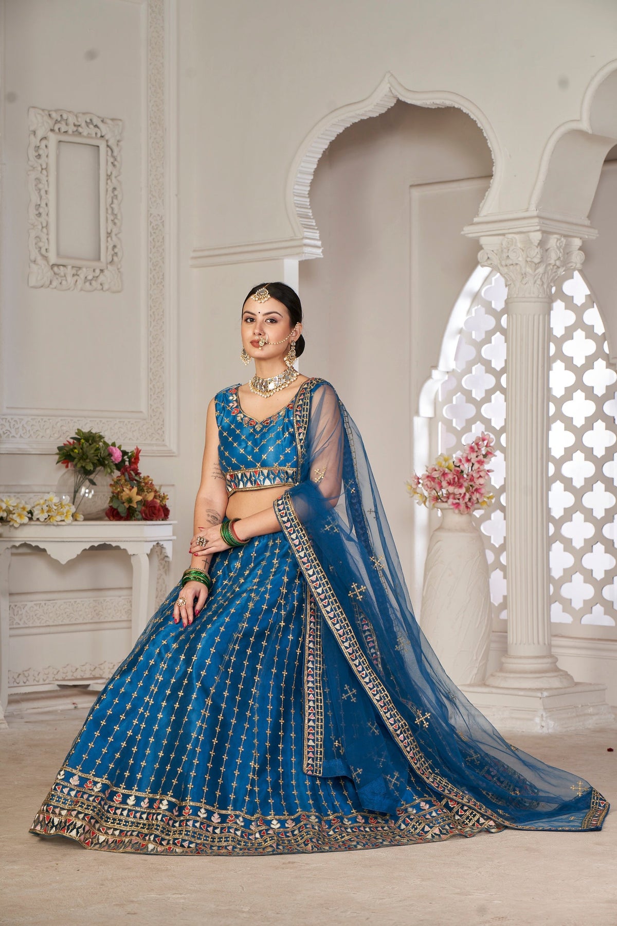 Elina Fashion Teal color Net Embroidery Work Lehenga Choli for Women