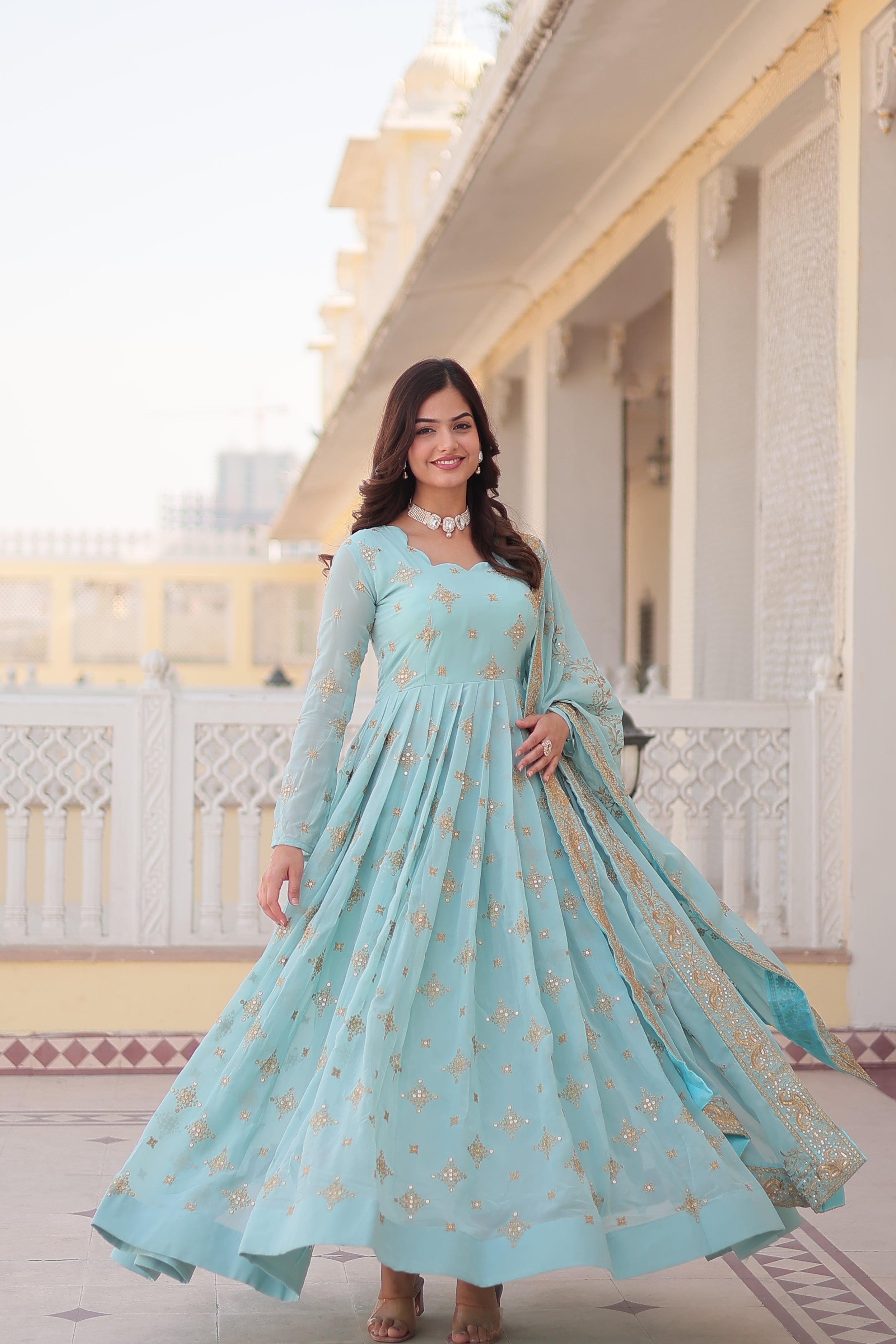 Sky Blue Colored Faux Georgette Sequins Embroidered  Gown With Dupatta