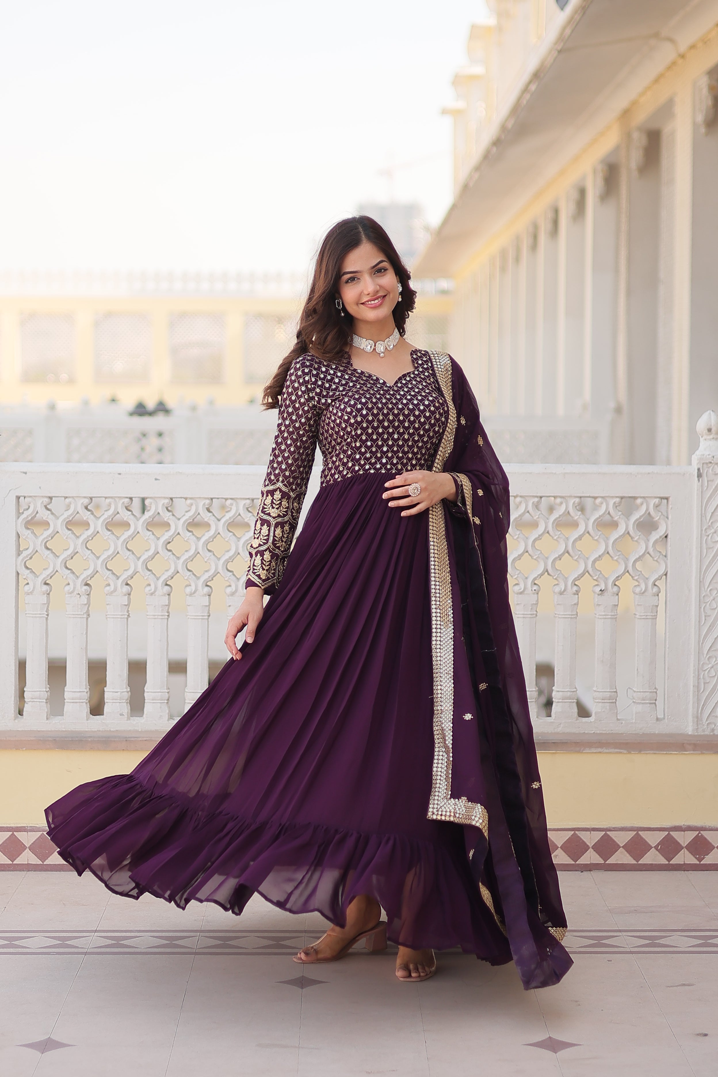 Wine Colored Faux Georgette Sequins Embroidered  Gown With Dupatta