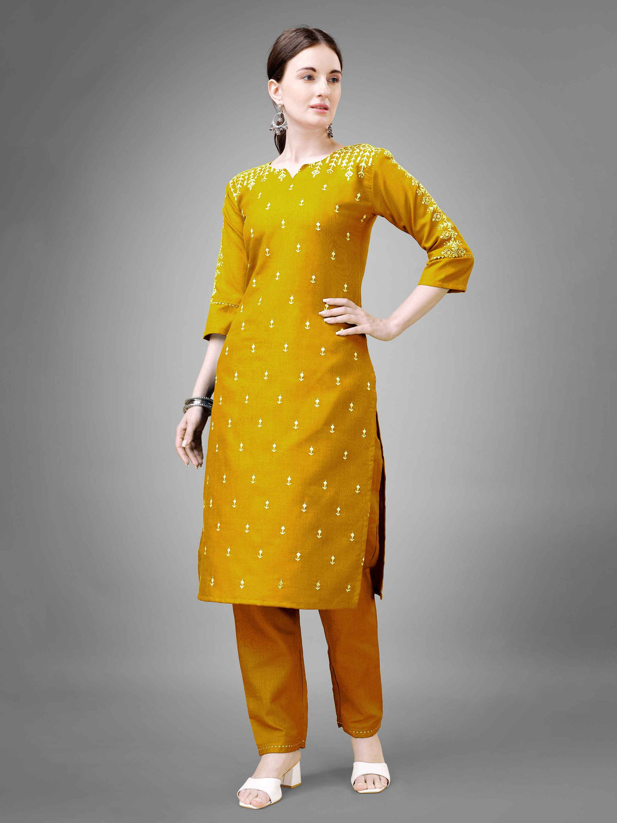 Yellow Colored Cotton Blend Embroidered Kurti With Pant