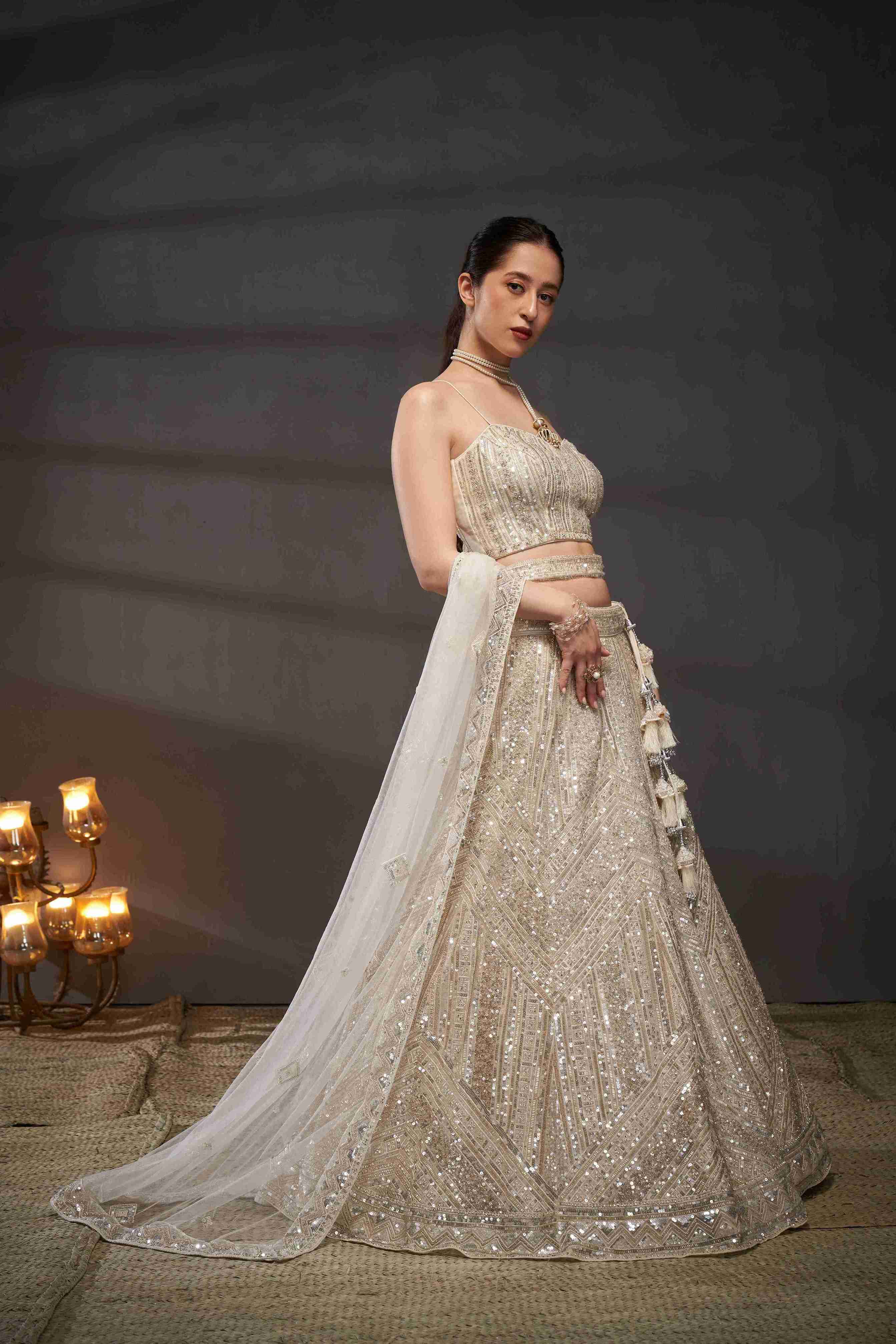 Cream  Net Thread Sequins Embroidered Lehenga Choli