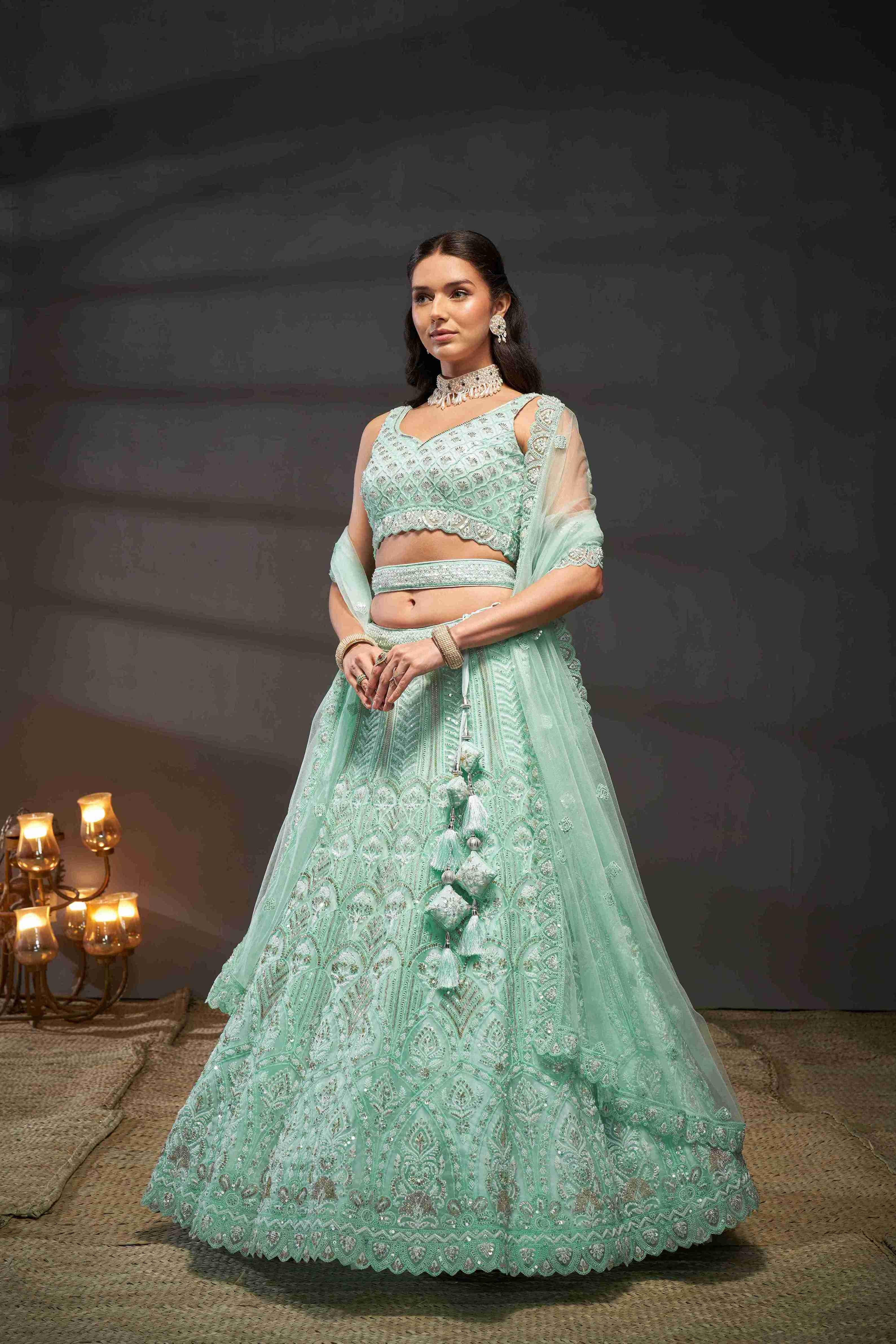 Turquoise  Net Thread Sequins Embroidered Lehenga Choli