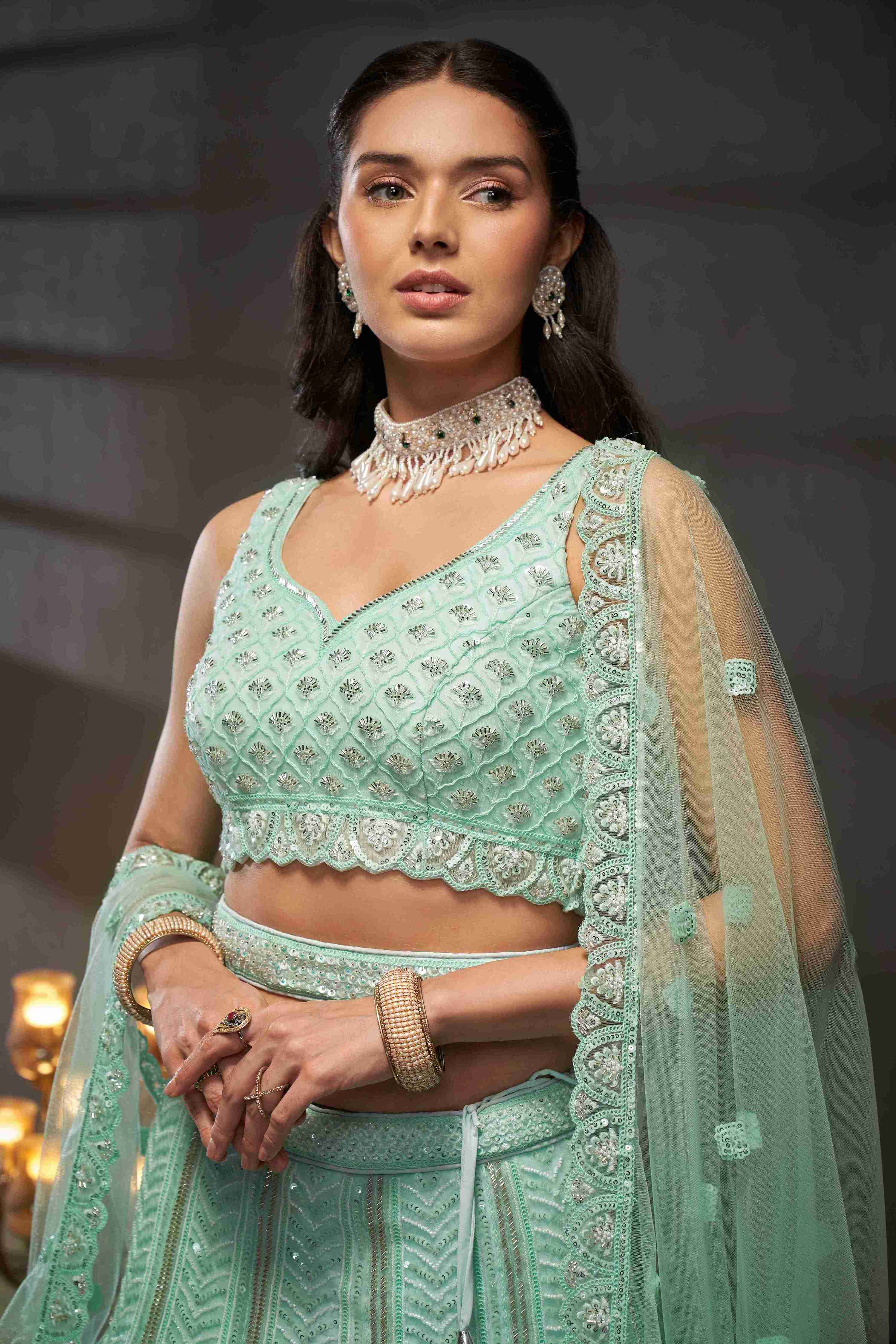 Turquoise  Net Thread Sequins Embroidered Lehenga Choli