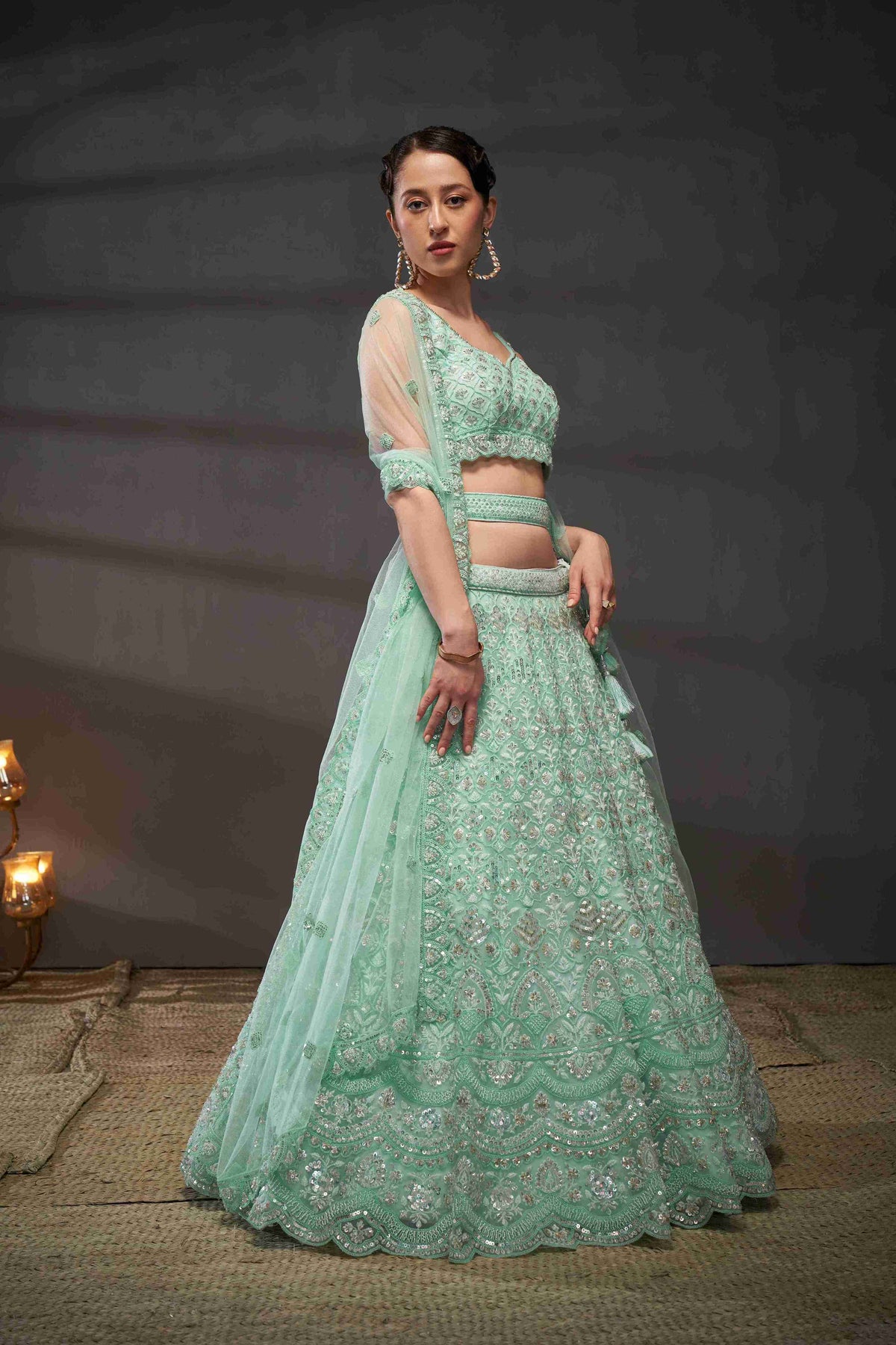 Turquoise  Net Thread Sequins Embroidered Lehenga Choli