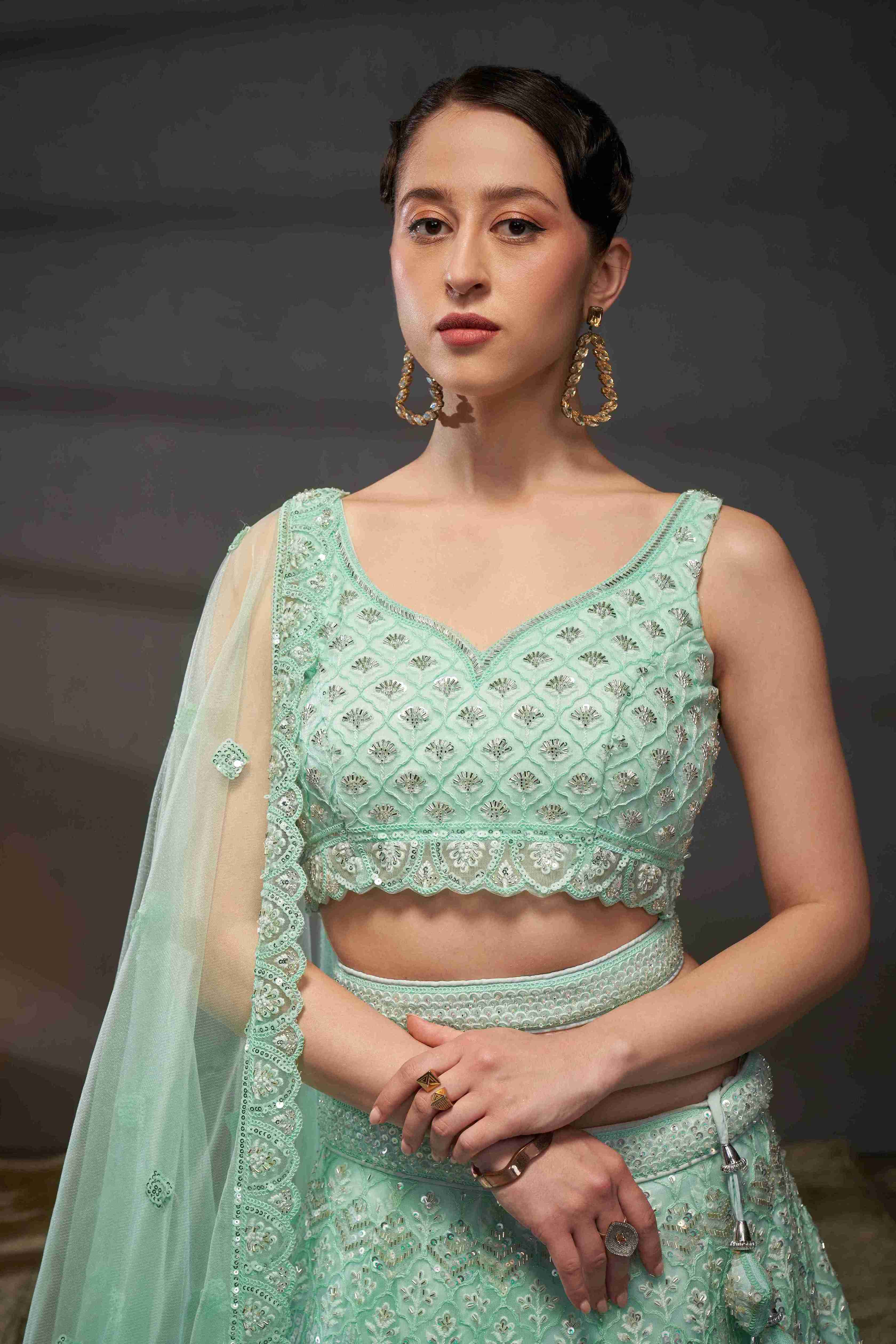 Turquoise  Net Thread Sequins Embroidered Lehenga Choli