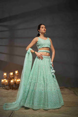 Turquoise  Net Thread Sequins Embroidered Lehenga Choli