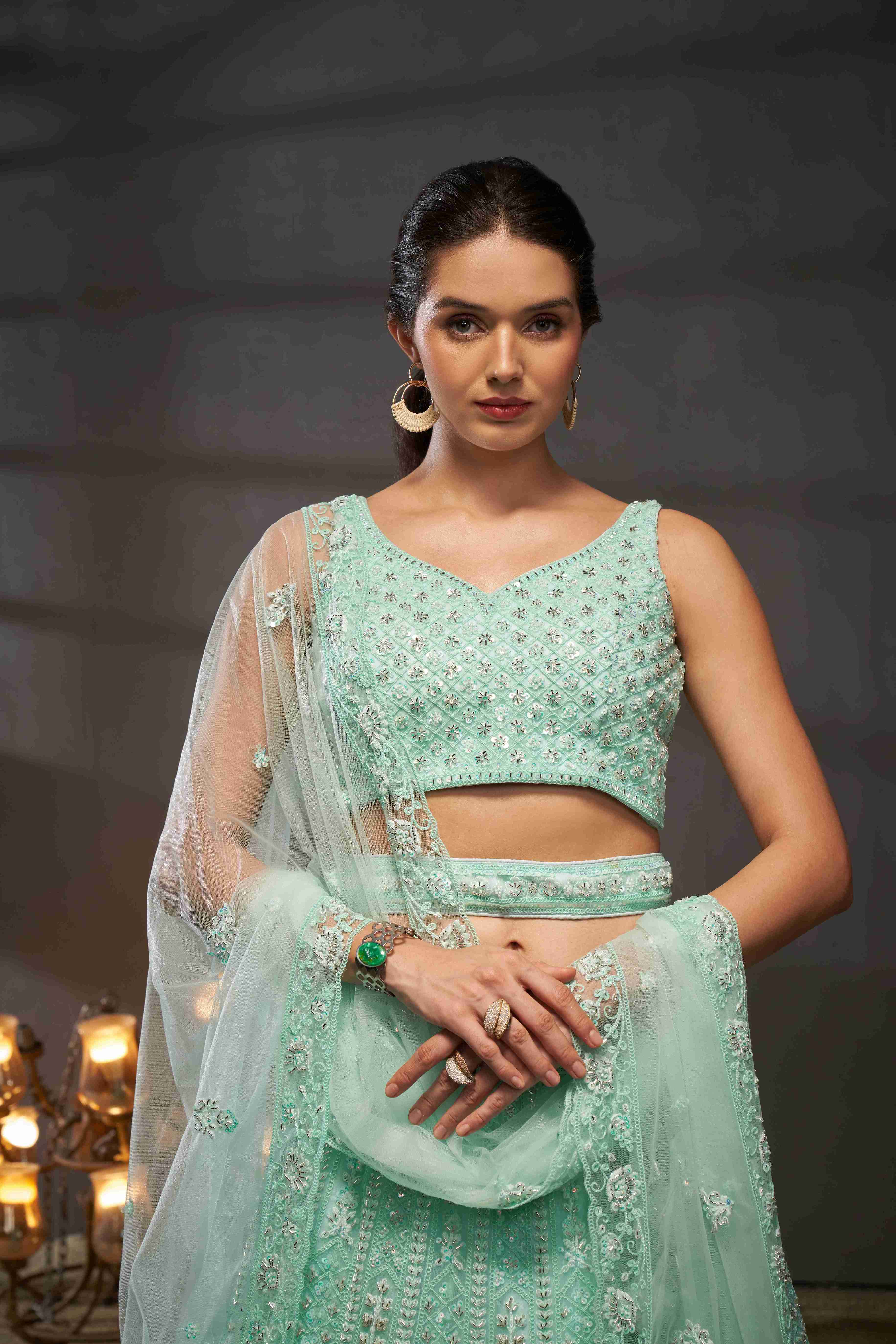 Turquoise  Net Thread Sequins Embroidered Lehenga Choli