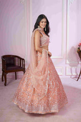 Pink Net Sequins Embroidered Lehenga Choli