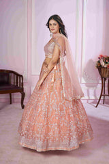 Pink Net Sequins Embroidered Lehenga Choli