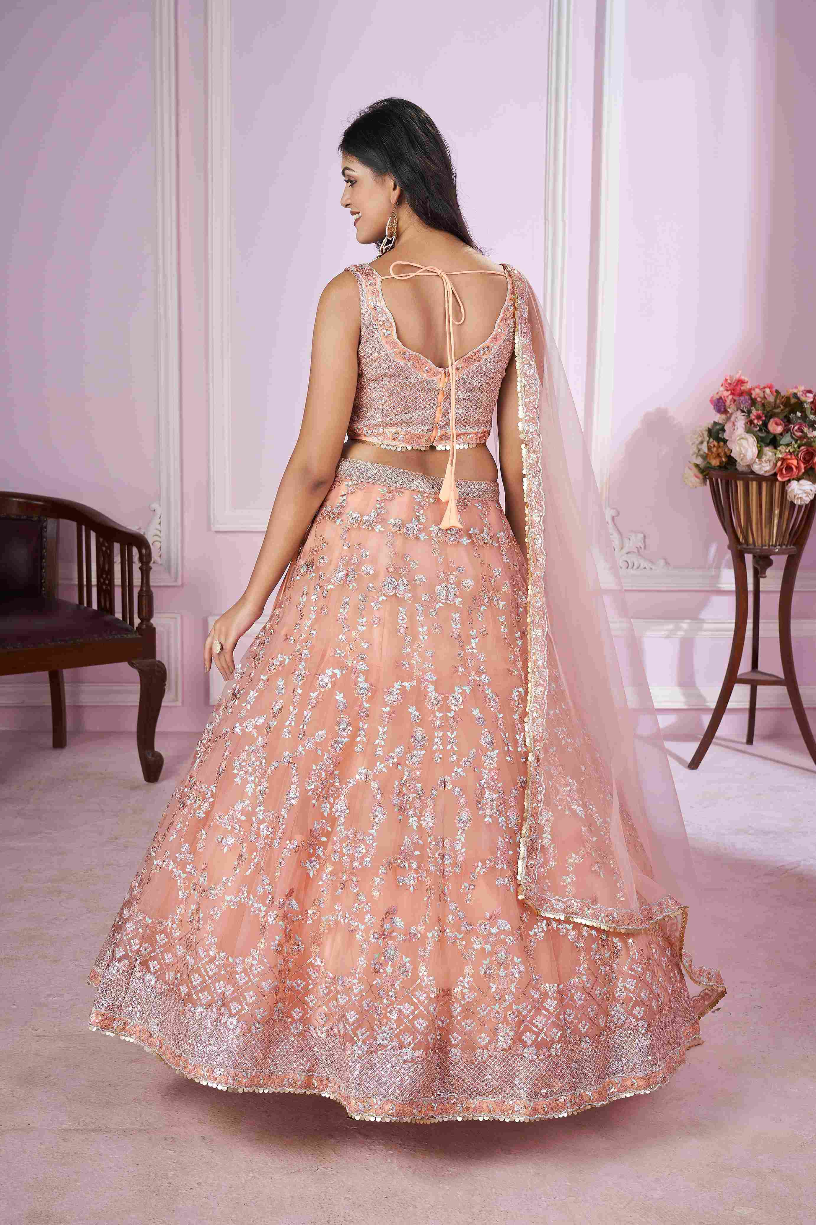 Pink Net Sequins Embroidered Lehenga Choli