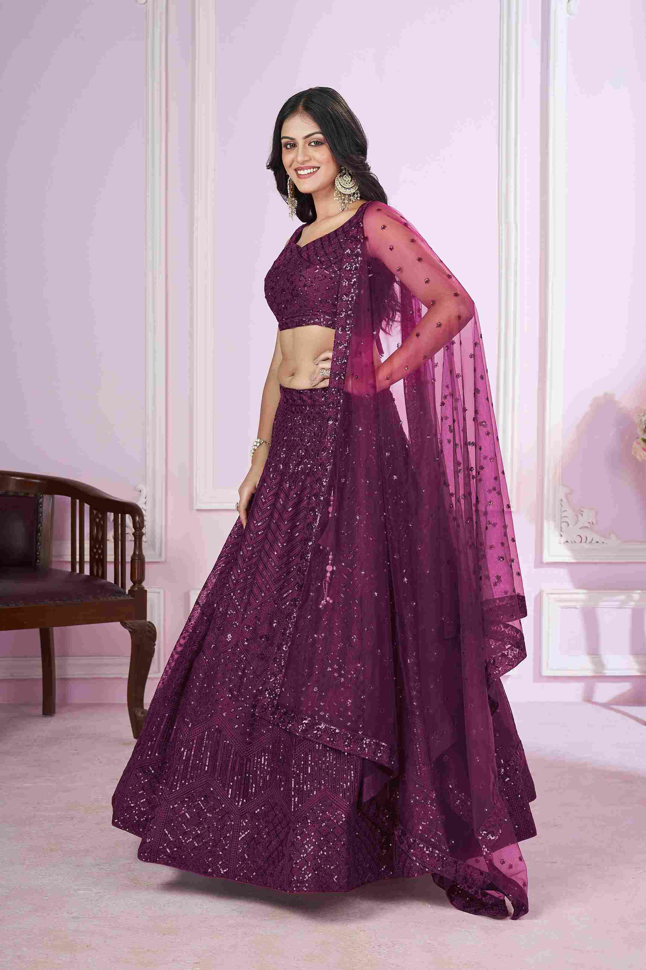 Purple Net Sequins Embroidered Lehenga Choli