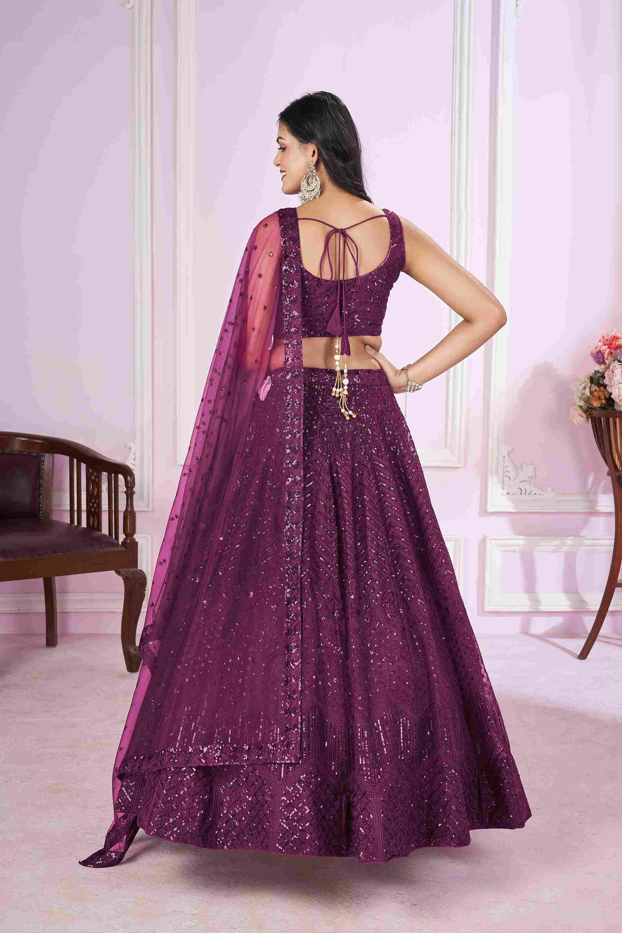 Purple Net Sequins Embroidered Lehenga Choli