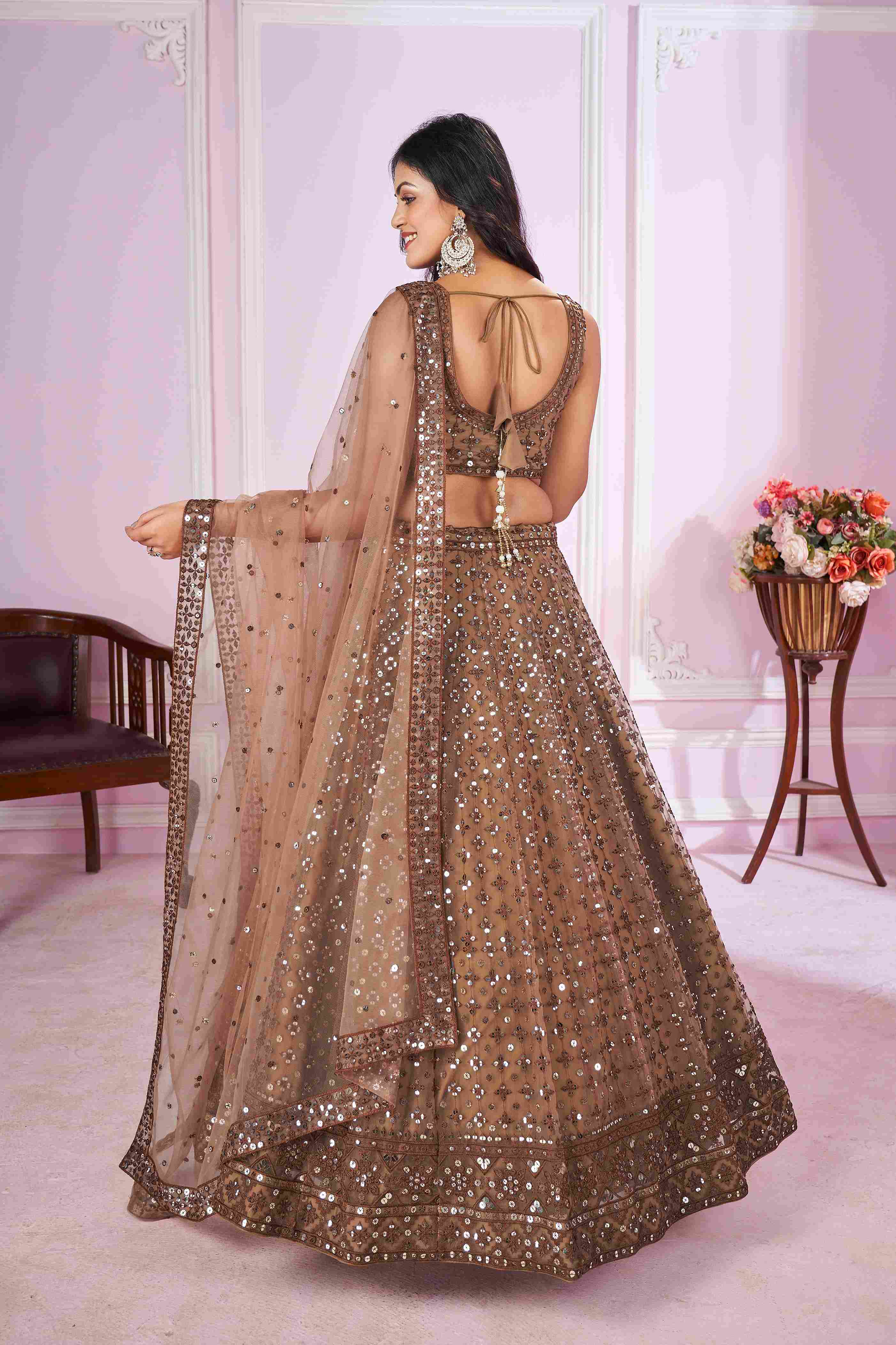 Brown Net Sequins Embroidered Lehenga Choli