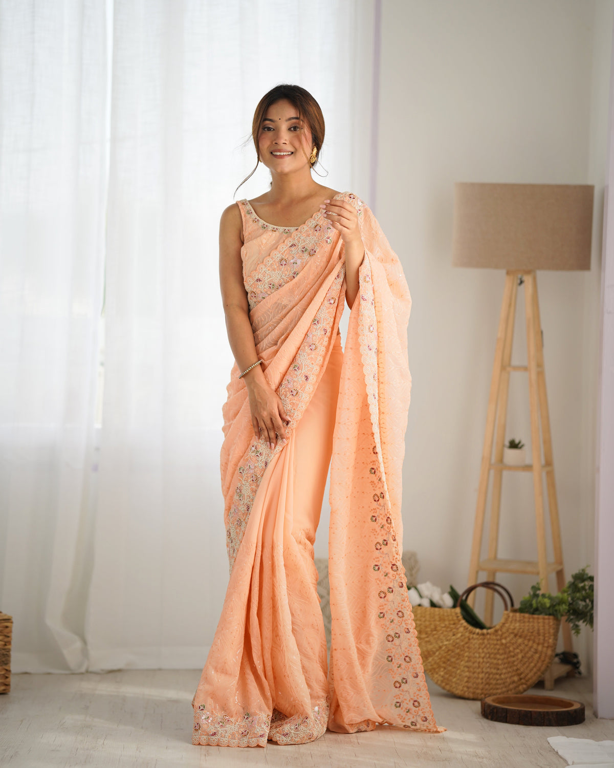 Peach Georgette Coding Sequins Embroidered Saree