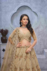 Golden Soft Net Embroidered Peacock Motif Lehenga Choli