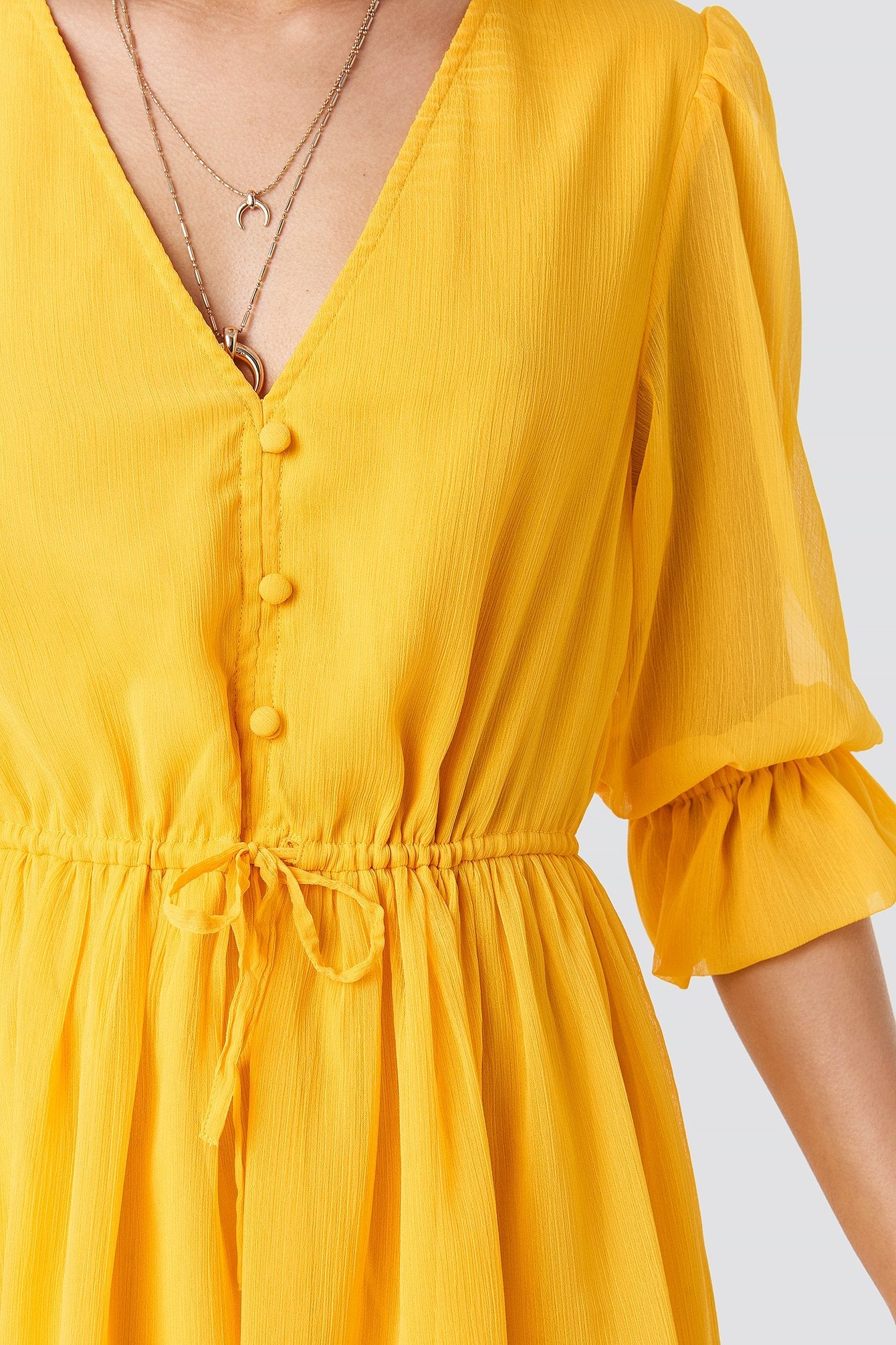 Robe en mousseline à décolleté plongeant en V jaune 